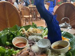 -沐毫傣泐云南菜孔雀宴•手抓饭傣味烧烤(曼听公园店)
