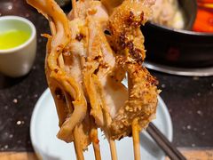 -明何记涮牛肚(品牌首店隋唐植物园南门古城路店)