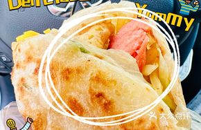 Hand-Grabbed Pancake with Intestine and Egg