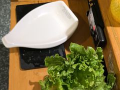 -明何记涮牛肚(品牌首店隋唐植物园南门古城路店)