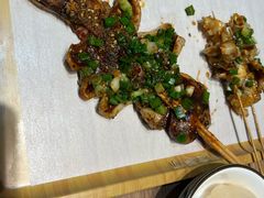 铁板鱿鱼-街角等你.大连海鲜烧烤.经典铁板海鲜串(西安路店)