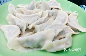 Handmade Dumplings with Napa Cabbage and Pork Fat Filling