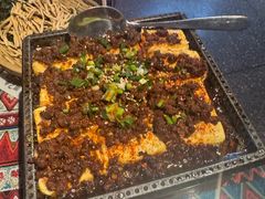 云南铁板包浆香豆腐-火塘云南烧烤大排档