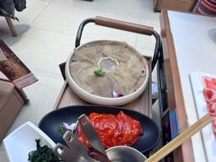 -老牌坊云南鱼豆花火锅(哈西万达店)