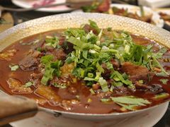 -周老三跷脚牛肉·全牛火锅(非遗传承店)