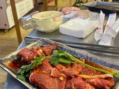 -彝人部落火盆烧烤(原内环足球场店)