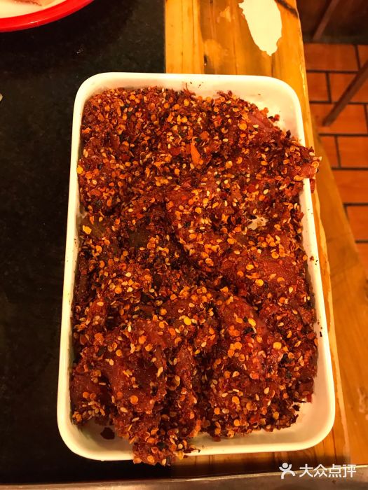 城门洞老火锅(胜利路店)秘制特色麻辣嫩牛肉图片