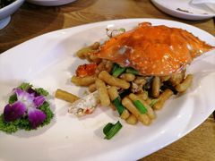 梭子蟹炒年糕-杭百味·大众精选杭帮菜(西湖音乐喷泉店)