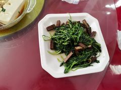 香干炒马兰头-唔呶喔哩酒家(生产街店)