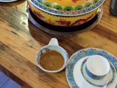 -毛辣果·贵州红酸汤牛肉火锅(西单店)