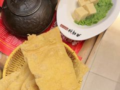 -老牌坊云南鱼豆花火锅(哈西万达店)
