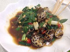 九层塔炒花螺-旅南活海鲜-屏东(墾丁海鮮，海鮮餐廳，墾丁團體合菜，平價熱炒，墾丁熱炒店，活海鮮推薦，在地海鮮餐廳)