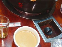-明何记涮牛肚(品牌首店隋唐植物园南门古城路店)