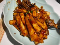 梭子蟹炒年糕-卯时·龙光雅宴·精致锡帮菜(惠山古镇店)