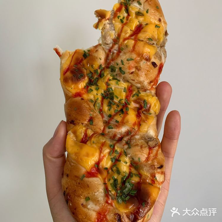 面包组织很好，内芯没有大片空网