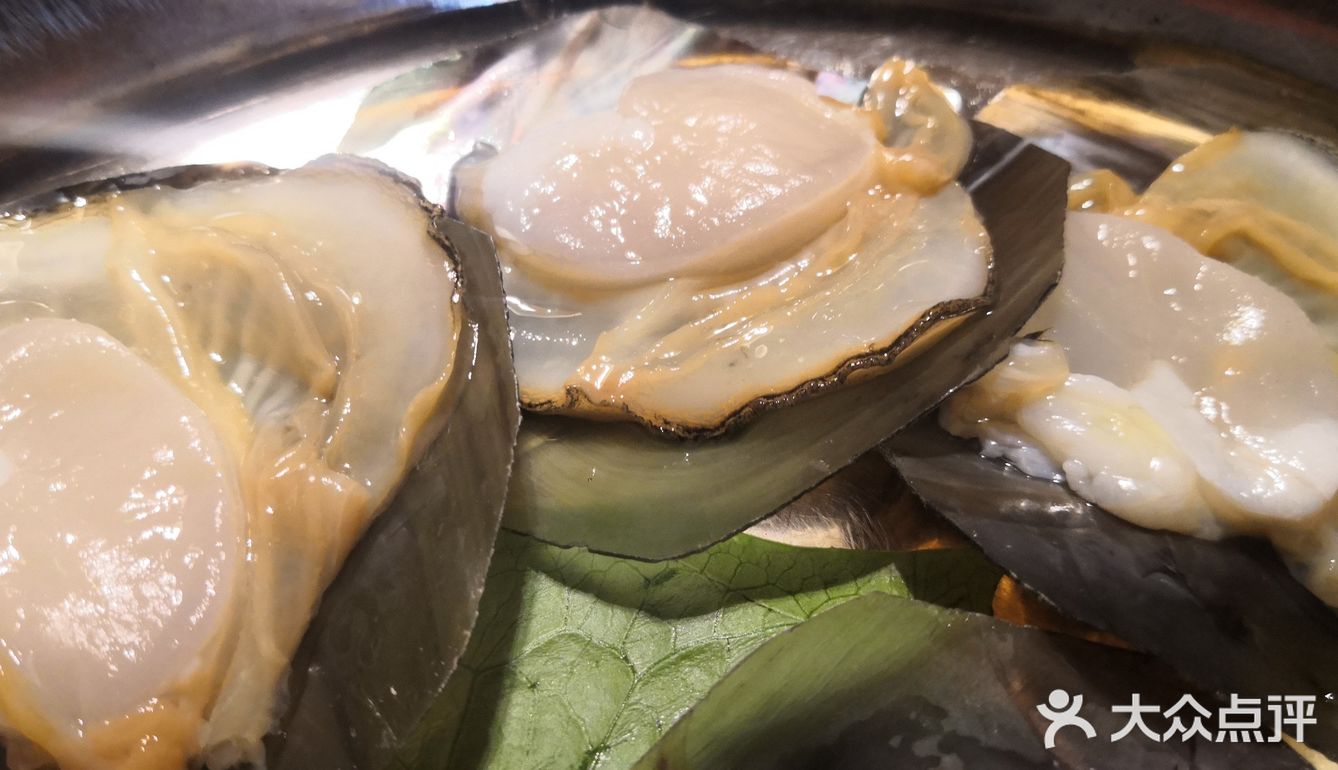 位置跟着导航很好找。点的粥水底，海螺切片