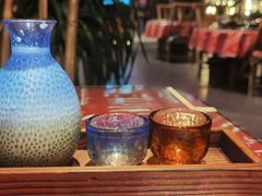 云南纂新奶白酒-火塘云南烧烤大排档