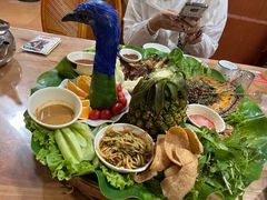 -沐毫傣泐云南菜孔雀宴•手抓饭傣味烧烤(曼听公园店)