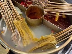 -明何记涮牛肚(品牌首店隋唐植物园南门古城路店)