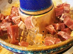 -毛辣果·贵州红酸汤牛肉火锅(西单店)