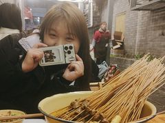 -拈签一笑黄牛肉辣卤串串