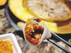 腌萝卜片-猪啊牛呀羊啊铜盘烤肉(正大广场店)