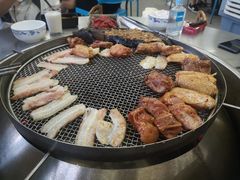 -彝人部落火盆烧烤(原内环足球场店)