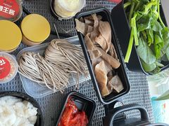 -老牌坊云南鱼豆花火锅(哈西万达店)