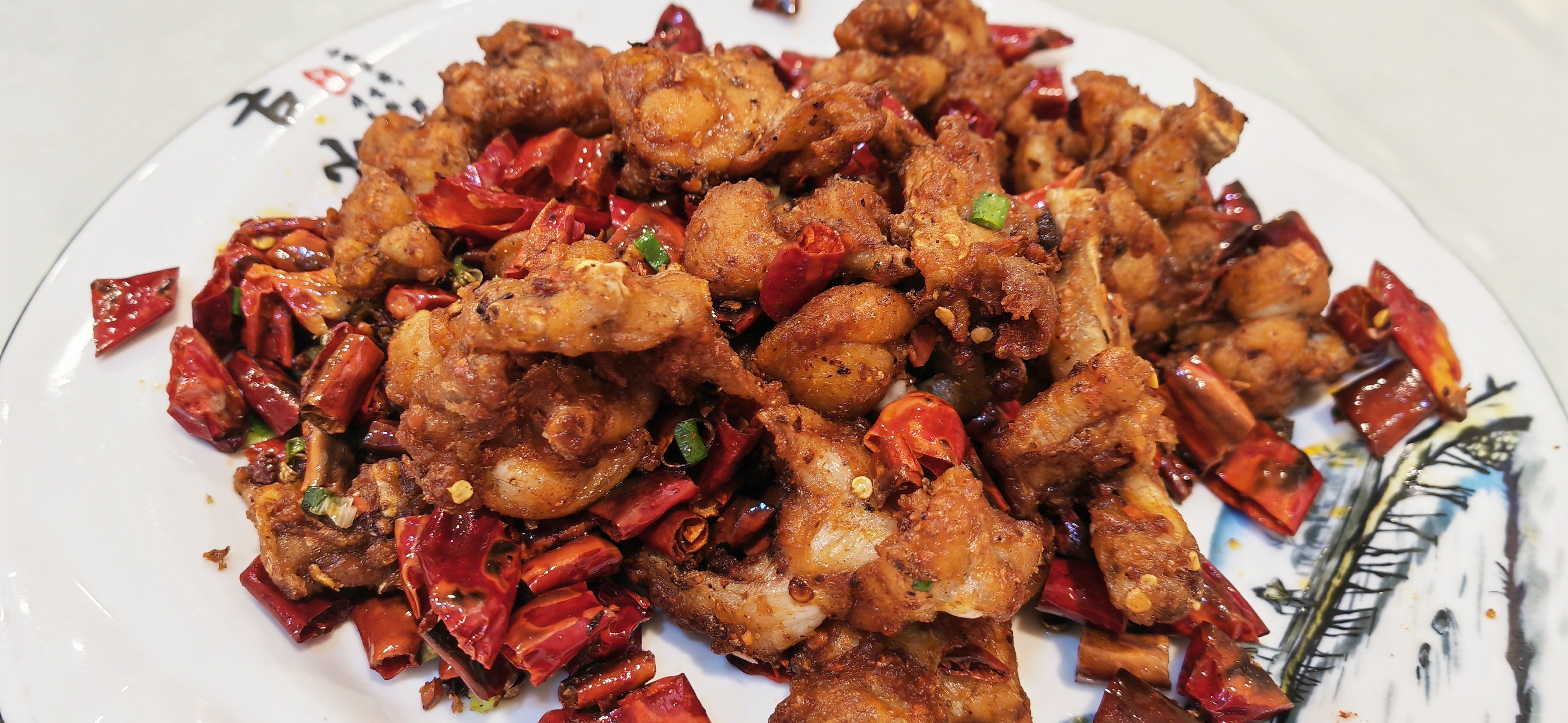 68一份的干煸牛蛙,炸得过头了有点糊