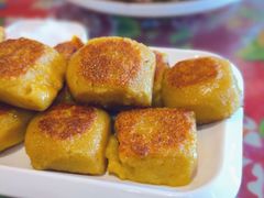 煎粘豆包-闯关东东北农家菜(崂山石老人店)
