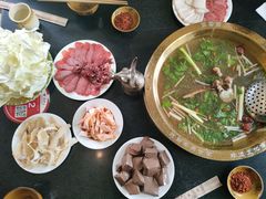 -周老三跷脚牛肉·全牛火锅(非遗传承店)