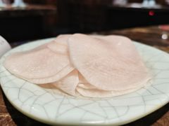 腌萝卜片-猪啊牛呀羊啊铜盘烤肉(正大广场店)