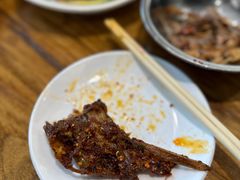 爆辣干锅鸭头-安诚居干锅鸭头(八角店)