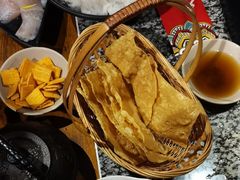 -老牌坊云南鱼豆花火锅(哈西万达店)