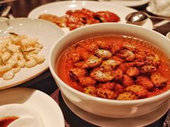 古越陈酿煮花螺-杭州西子湖四季酒店·金沙厅