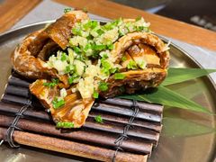 草家特色秘制牛排-草家酱蟹炭火烤肉店(珲春南路一店)