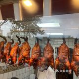 建华路上的人气烤鸭店和汤包店~