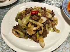 葱爆羊羔肉-巴扎美食·新疆菜·西域歌舞表演餐厅(新疆大厦店)