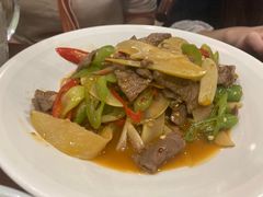 酸木瓜炒牛肉-紫滇源云南生态菜(丹凤街店)