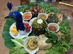 -沐毫傣泐云南菜孔雀宴•手抓饭傣味烧烤(曼听公园店)