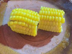 老板娘赠的玉米-古城苗家土菜馆(河景餐厅店)