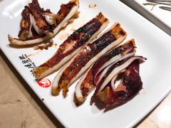 烤鱿鱼-金太阳海鲜烧烤·本地人餐厅(星海公园店)