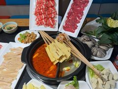 -明何记涮牛肚(品牌首店隋唐植物园南门古城路店)