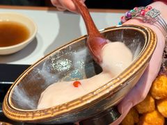 -老牌坊云南鱼豆花火锅(哈西万达店)