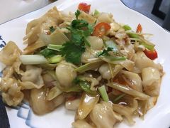 葱爆螺片-富临港·蒸汽海鲜·手抓海鲜·炒菜(栈桥店)