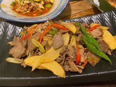 酸木瓜炒牛肉-紫滇源云南生态菜(丹凤街店)
