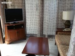 客厅内部-三亚亚龙湾铂尔曼别墅度假酒店