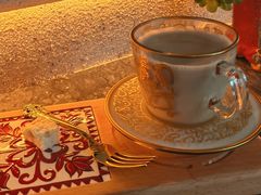 奶茶配骆驼奶疙瘩-龟兹KUCINA·新疆菜(前滩L+PLAZA店)