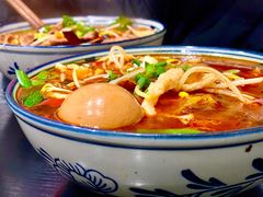 酸菜肉丝米线-梓袍面庄(渝北店)