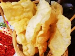 -老牌坊云南鱼豆花火锅(哈西万达店)
